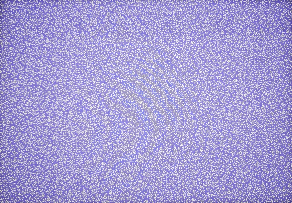 Popelín lila florecitas blancas